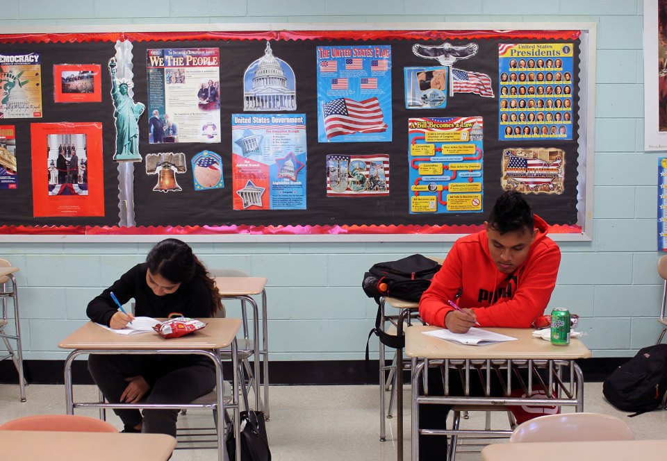 High schoolers in a social studies class at Patchogue-Medford work on a lesson about the history of nationalism.