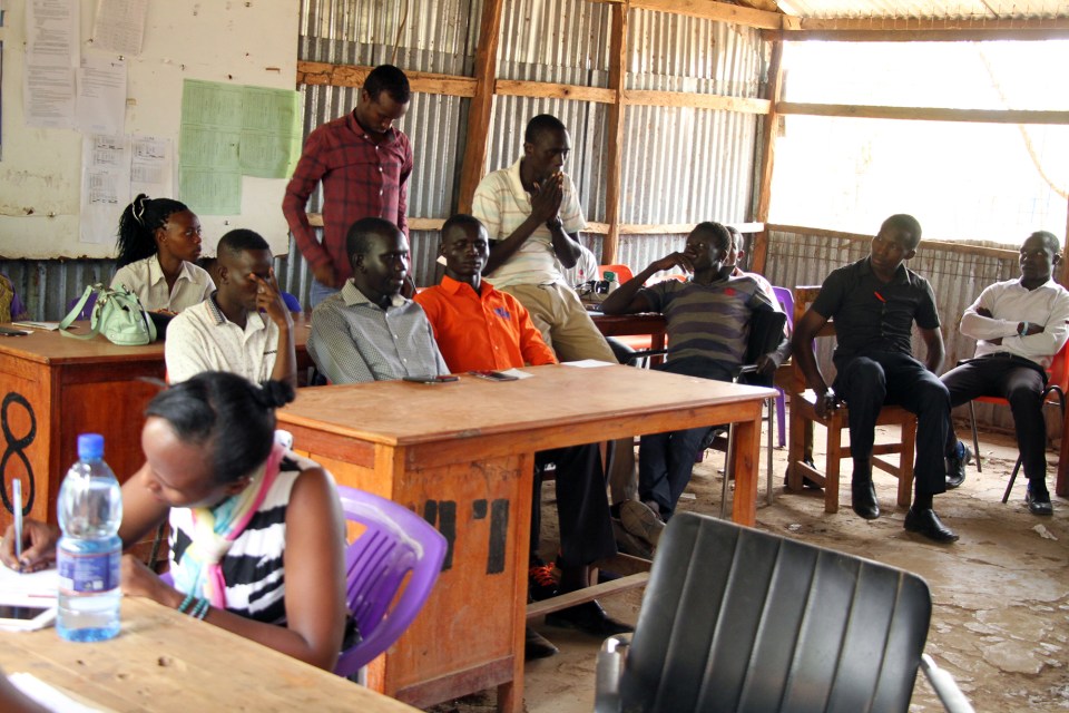 Kakuma Refugee Secondary School teachers meet in the staff room on the Monday of the second week of a new term. Due to contract problems, the school was without most teachers the previous week.